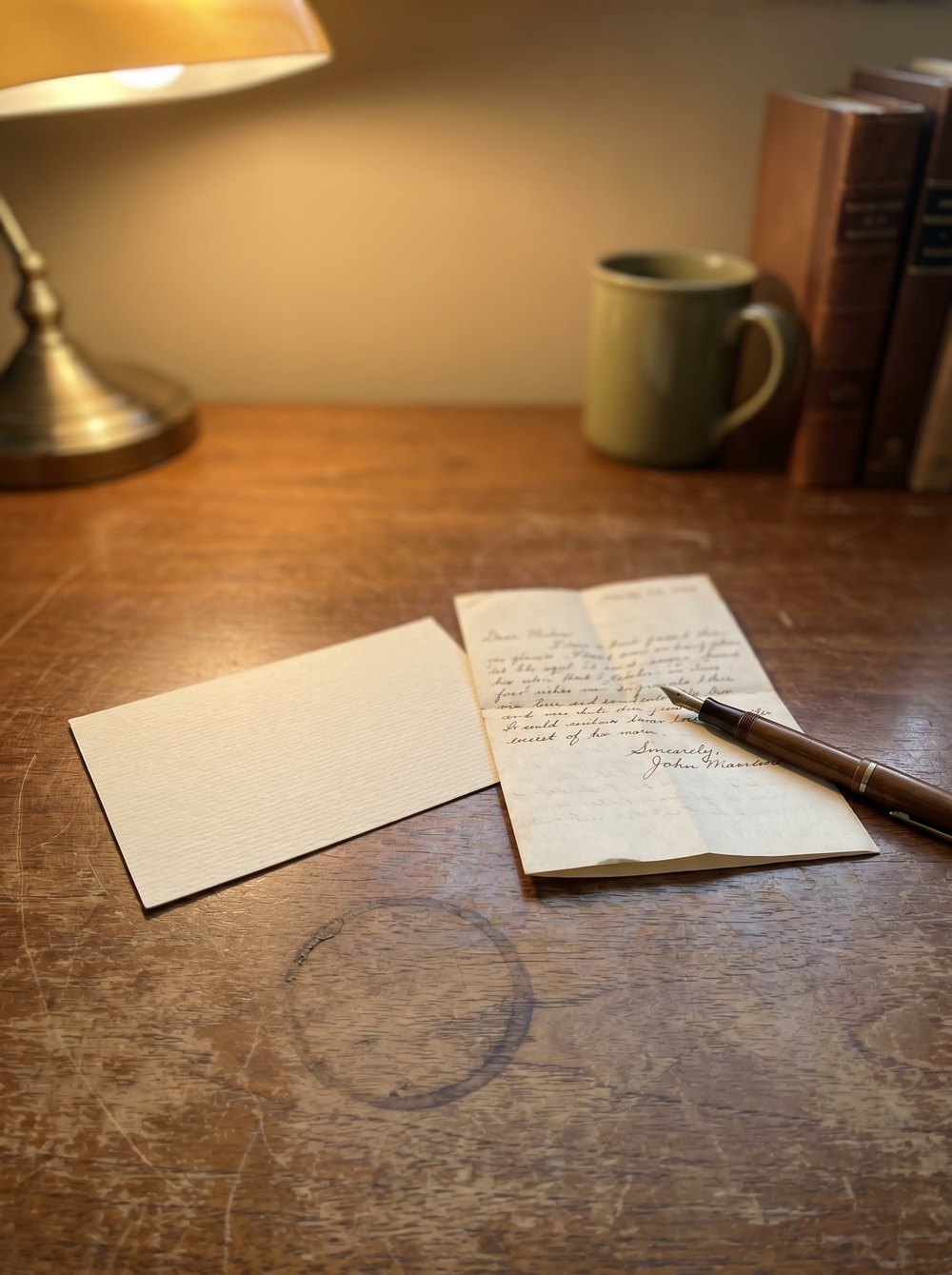 A single printable retirement checklist page with reading glasses and a pen on a warm wooden desk.